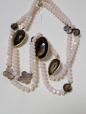 Soft blush pink, smoky brown, and gold-tone accents Necklace